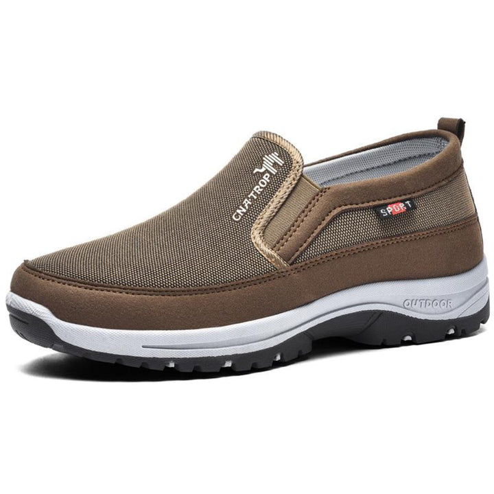 "Chaussures de marche orthopédiques pour hommes, tige en mesh respirant, semelle coussinée, confort et support optimal."