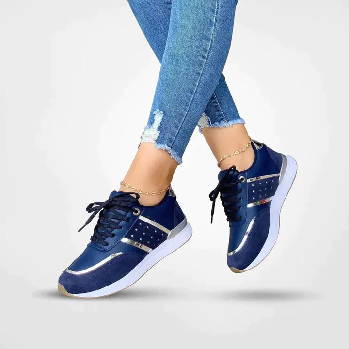 Chaussures orthopédiques élégantes pour femme, design moderne, cuir souple, semelles Vibram pour confort et adhérence.