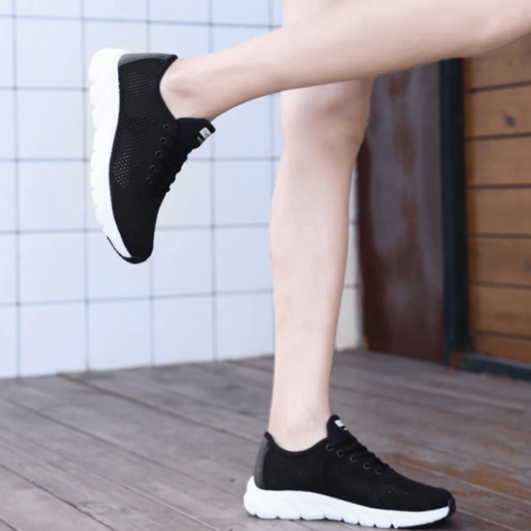 "Chaussures orthopédiques modernes, respirantes, élégantes, vue avant, blanc, noir ou rose, confort et style pour femmes."