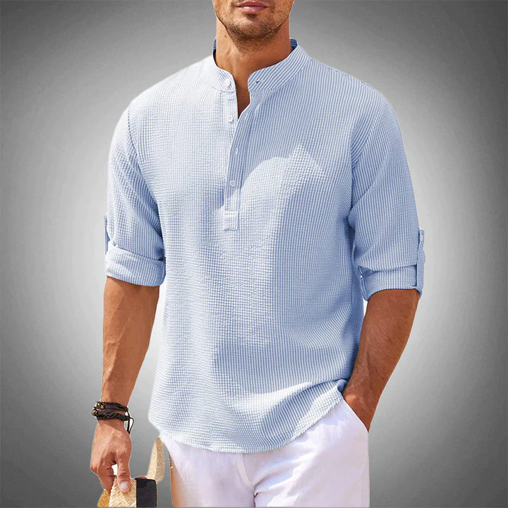 "Chemise à manches longues homme, coupe ajustée, élégante, en tissu respirant pour un confort quotidien optimal."