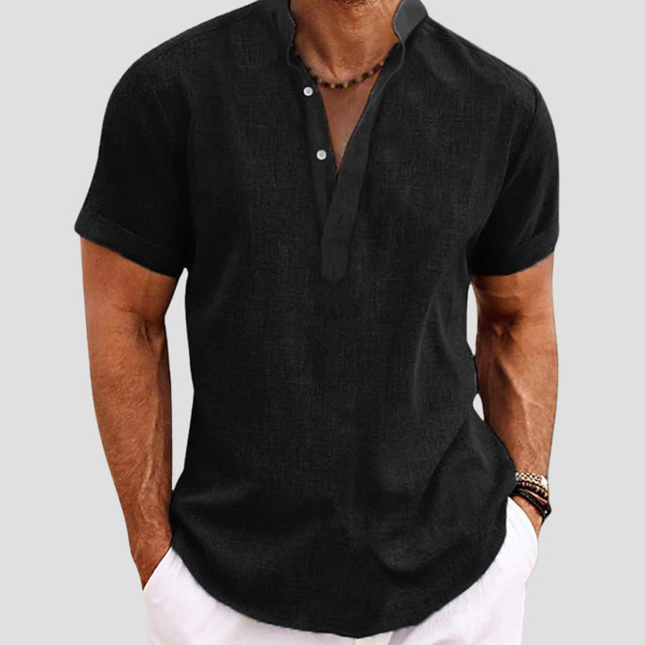 "Chemise en lin décontractée, coupe ample, col mao, manches retroussables, tissu respirant, style estival chic."