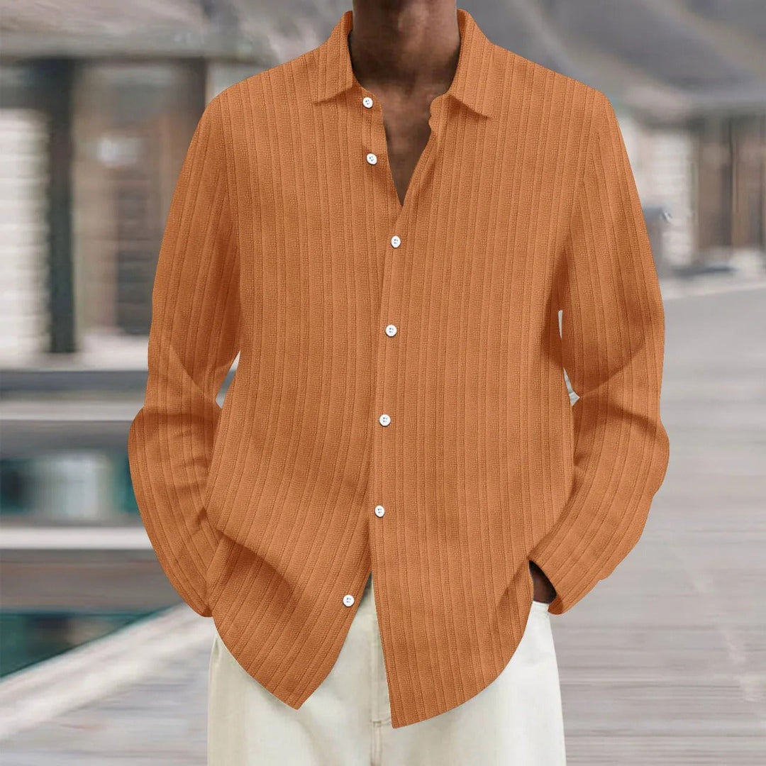 "Chemise en lin noire élégante pour homme, manches longues, style moderne, disponible en plusieurs couleurs"