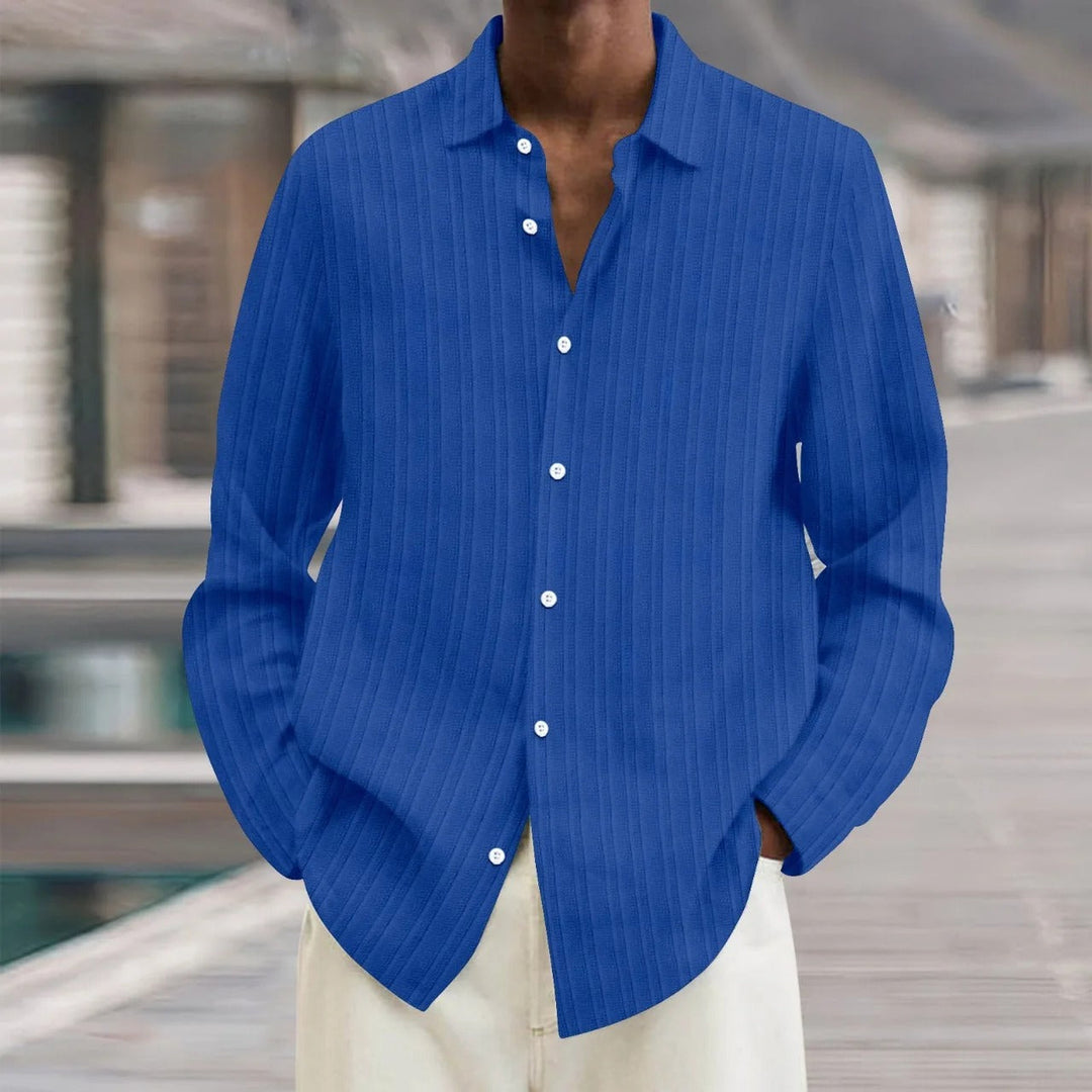"Chemise en lin noire élégante pour homme, manches longues, style moderne, disponible en plusieurs couleurs"