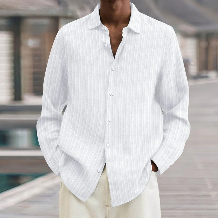 "Chemise en lin noire élégante pour homme, manches longues, style moderne, disponible en plusieurs couleurs"