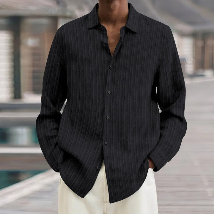 "Chemise en lin noire élégante pour homme, manches longues, style moderne, disponible en plusieurs couleurs"