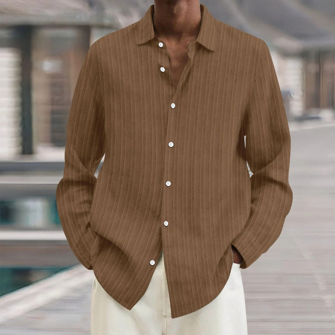 "Chemise en lin noire élégante pour homme, manches longues, style moderne, disponible en plusieurs couleurs"