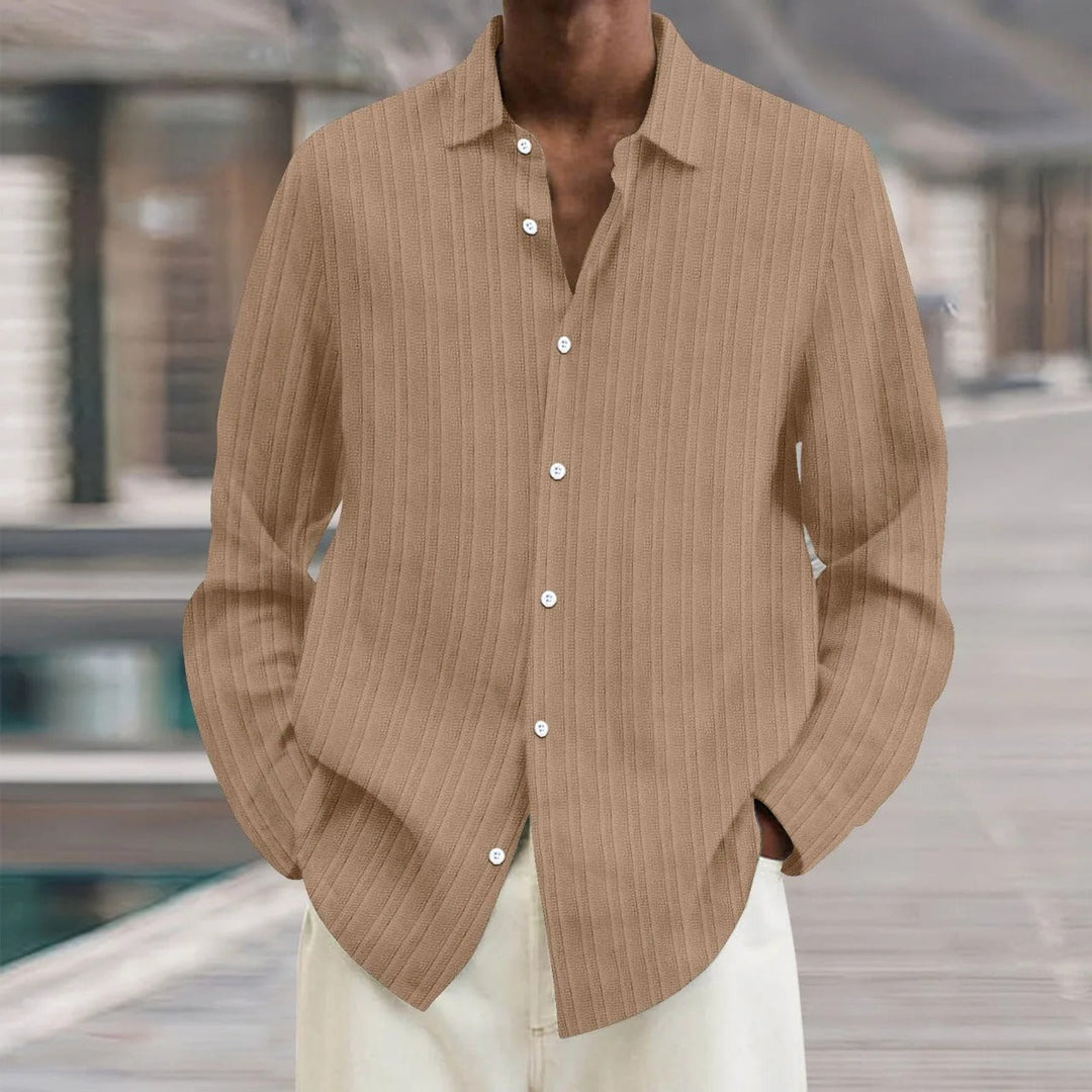 "Chemise en lin noire élégante pour homme, manches longues, style moderne, disponible en plusieurs couleurs"