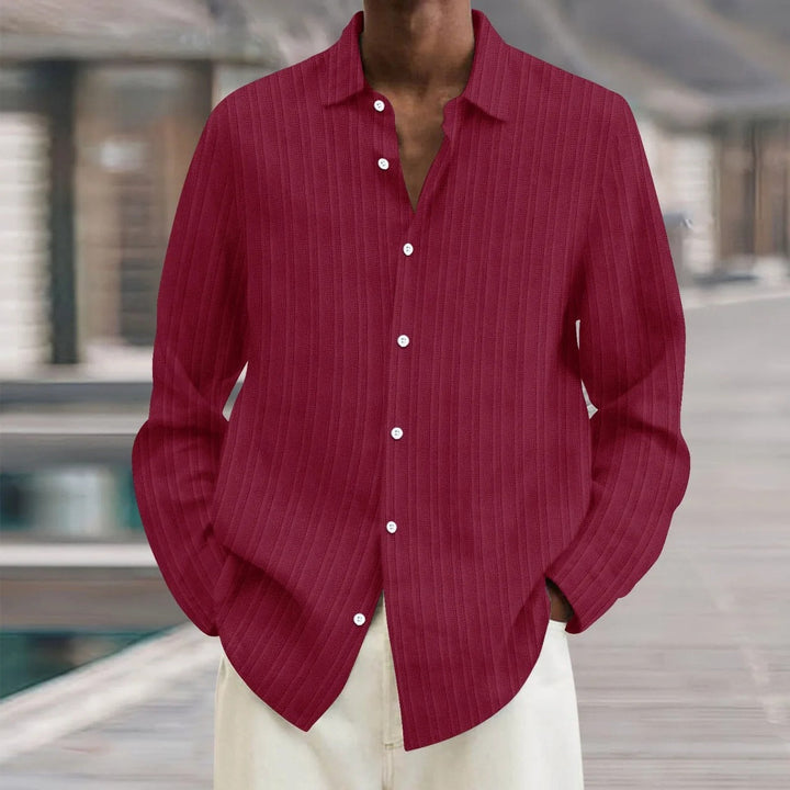 "Chemise en lin noire élégante pour homme, manches longues, style moderne, disponible en plusieurs couleurs"