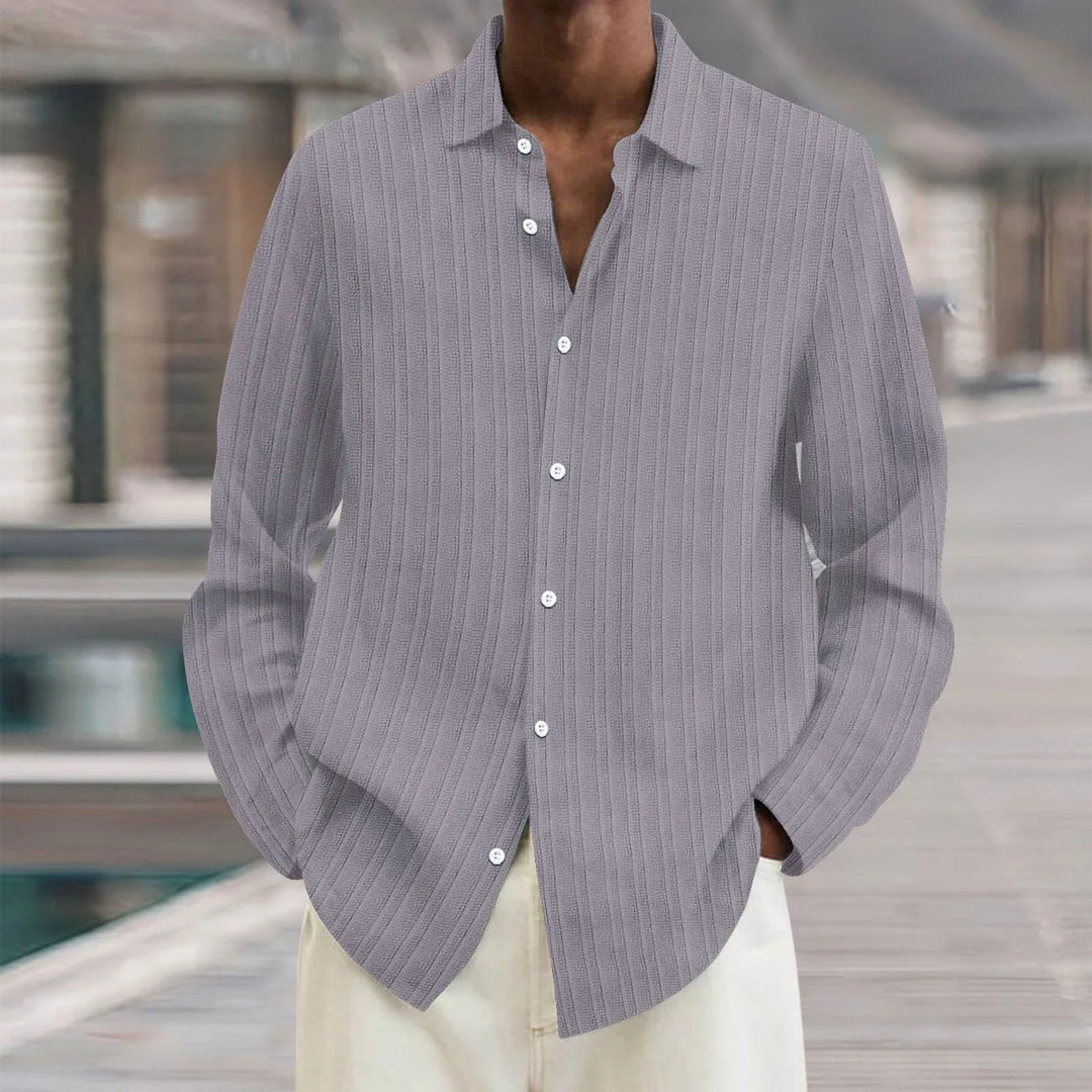 "Chemise en lin noire élégante pour homme, manches longues, style moderne, disponible en plusieurs couleurs"