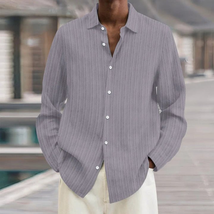 "Chemise en lin noire élégante pour homme, manches longues, style moderne, disponible en plusieurs couleurs"