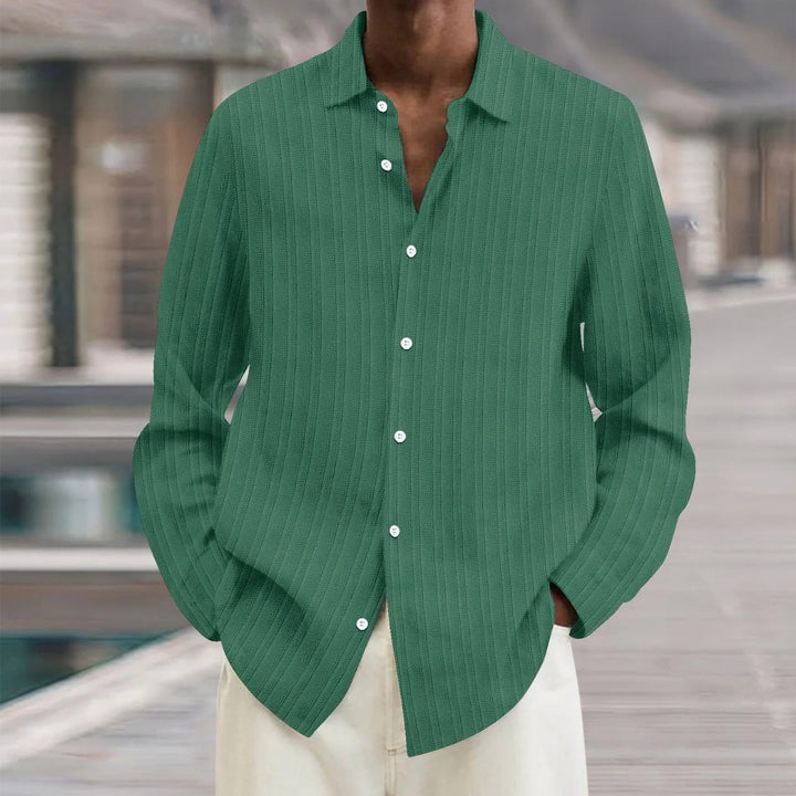 "Chemise en lin noire élégante pour homme, manches longues, style moderne, disponible en plusieurs couleurs"