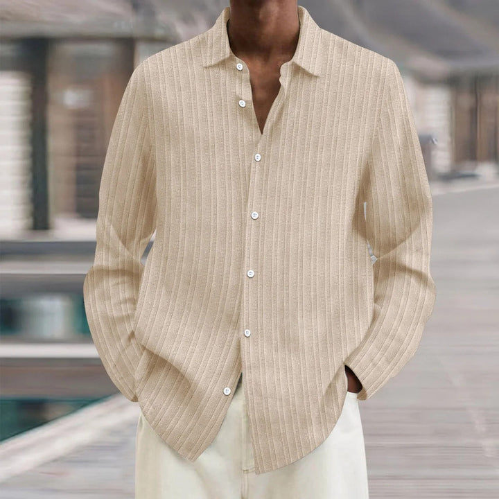 "Chemise en lin noire élégante pour homme, manches longues, style moderne, disponible en plusieurs couleurs"