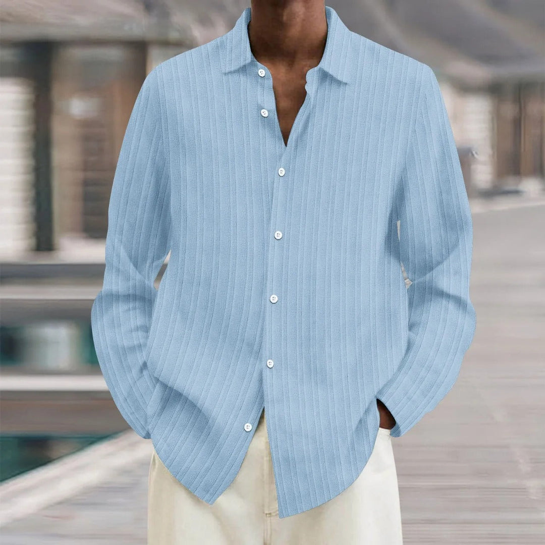 "Chemise en lin noire élégante pour homme, manches longues, style moderne, disponible en plusieurs couleurs"