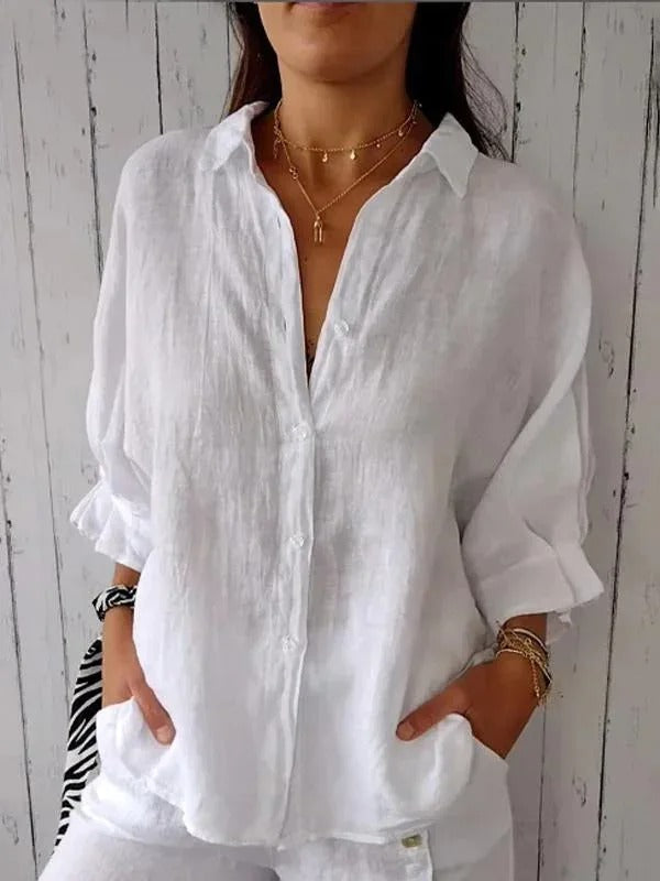 Chemise femme en lin, manches longues, coupe décontractée, col classique pour style élégant et confort respirant.