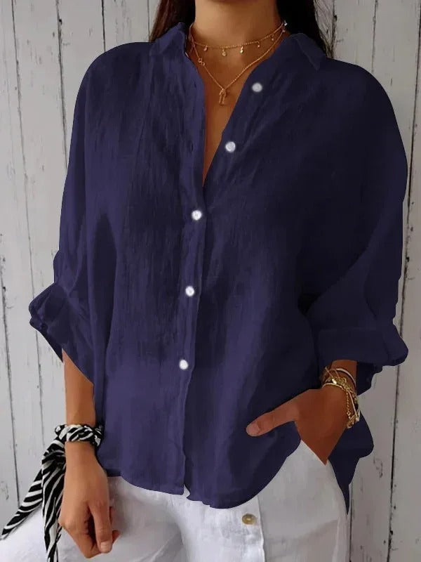 Chemise femme en lin, manches longues, coupe décontractée, col classique pour style élégant et confort respirant.