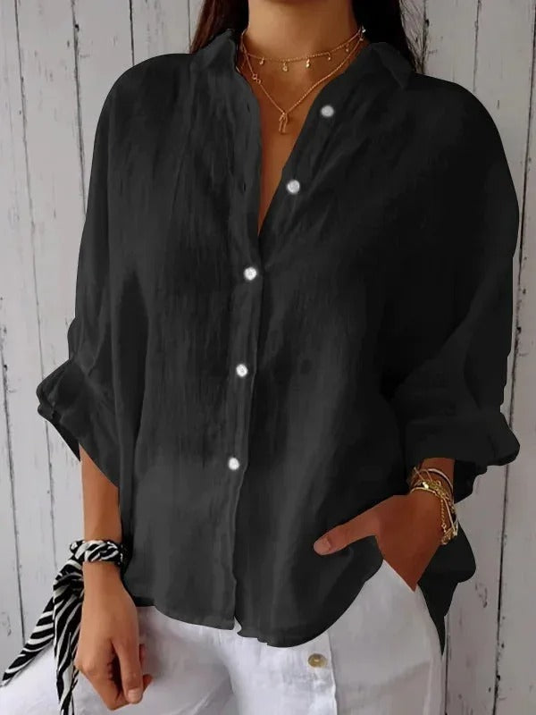 Chemise femme en lin, manches longues, coupe décontractée, col classique pour style élégant et confort respirant.