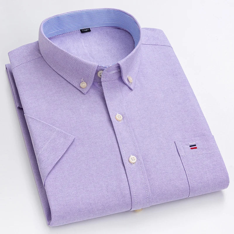 "Chemise homme élégante à manches courtes avec motifs à carreaux, style moderne, coton 100% pour confort et sophistication."