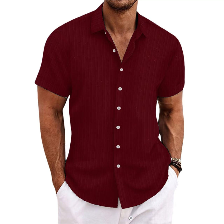"Chemise homme élégante, manches longues, rayures, coton et lin, idéale pour style formel ou décontracté."