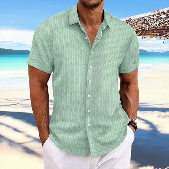 "Chemise homme élégante, manches longues, rayures, coton et lin, idéale pour style formel ou décontracté."