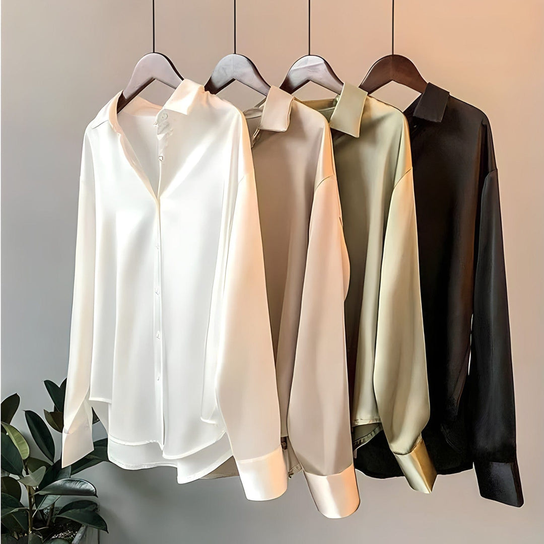 "Chemise satin femme chic, finition satinée douce, coloris blanc, idéal pour allure élégante et occasions spéciales."