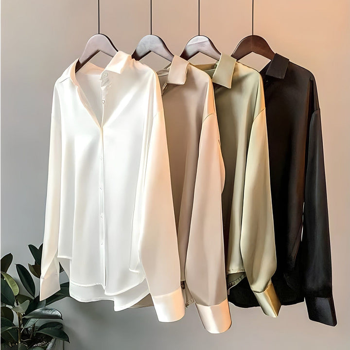 "Chemise satin femme chic, finition satinée douce, coloris blanc, idéal pour allure élégante et occasions spéciales."