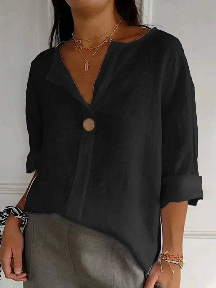 "Chemisier décontracté en lin pour femme, col V élégant, coupe légère et épurée, idéal pour un style quotidien raffiné."