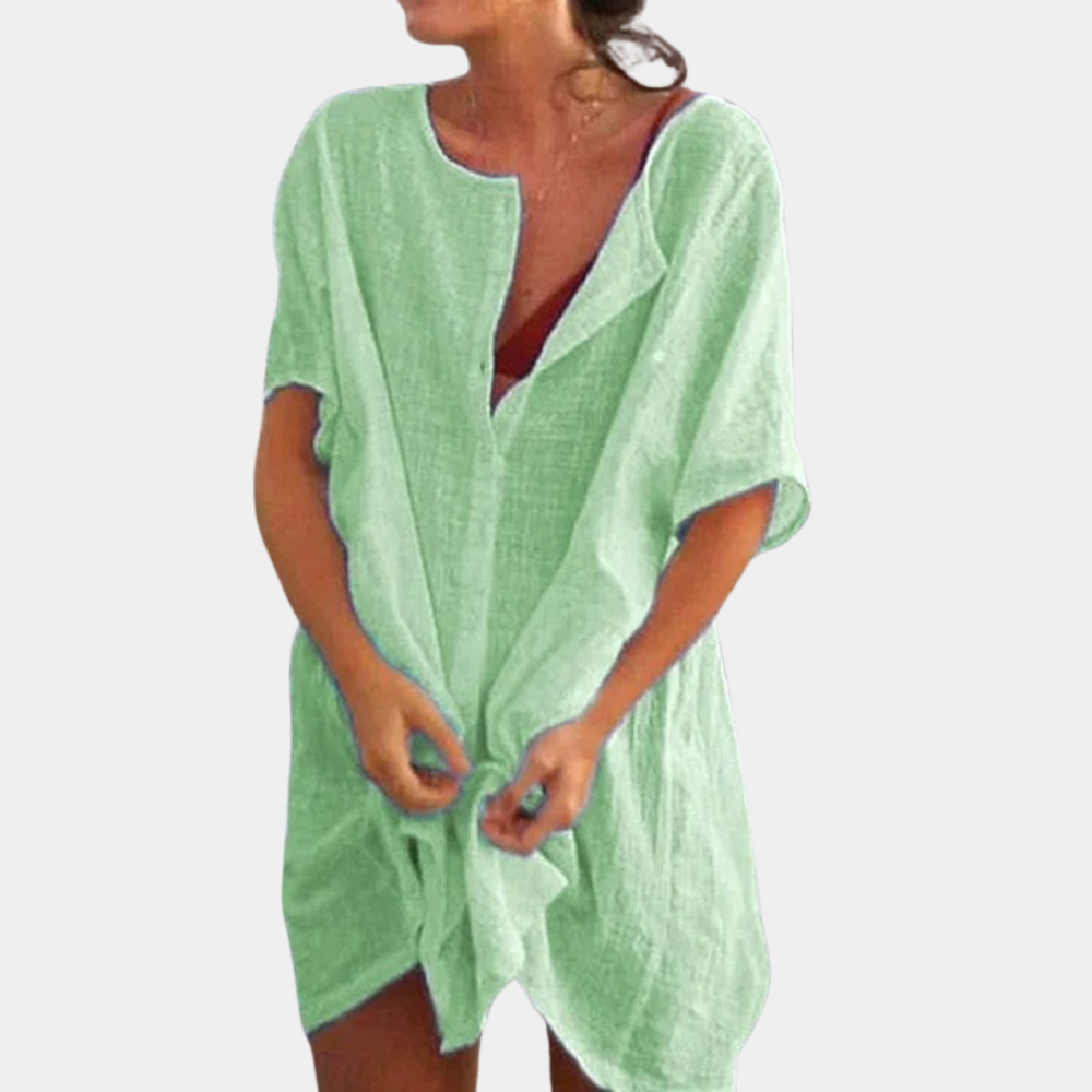 "Chemisier d'été ample en lin vert, coupe fluide, léger pour un style décontracté féminin."