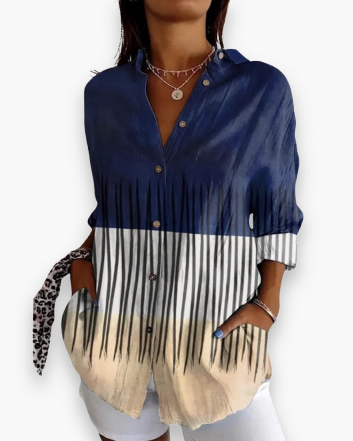 "Chemisier femme élégant avec imprimé moderne, style chic et confort, polyvalent pour looks casual et raffinés."