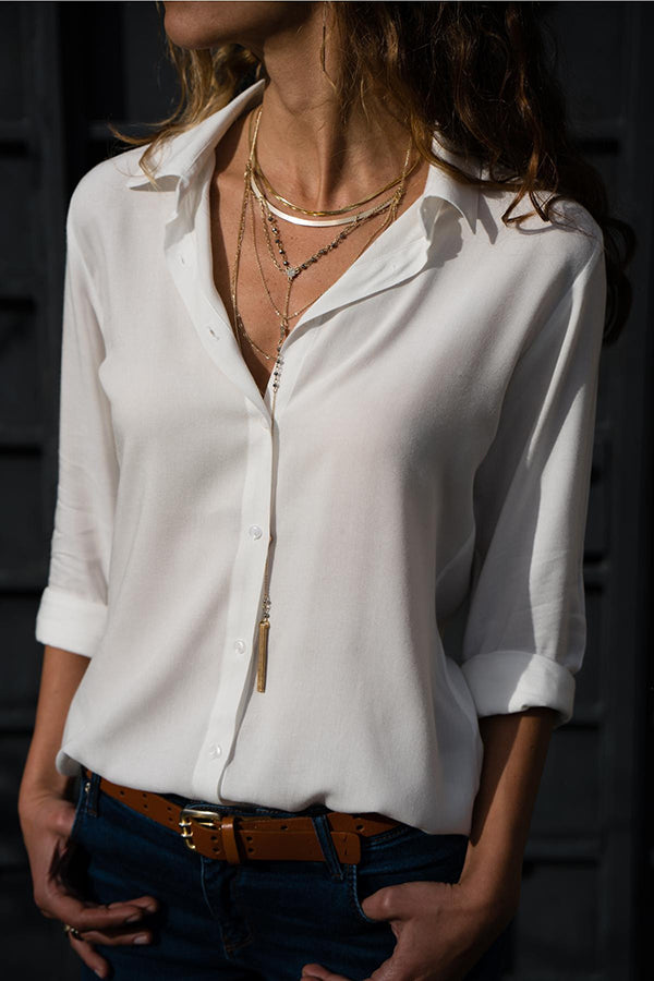 Chemisier femme élégant léger et confortable, tissu respirant, couleurs variées, coupe fluide et chic pour toutes occasions.