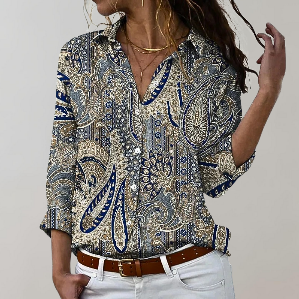 Chemisier femme élégant Lumia, manches longues, imprimés variés, tissu fluide et moderne pour un style polyvalent.