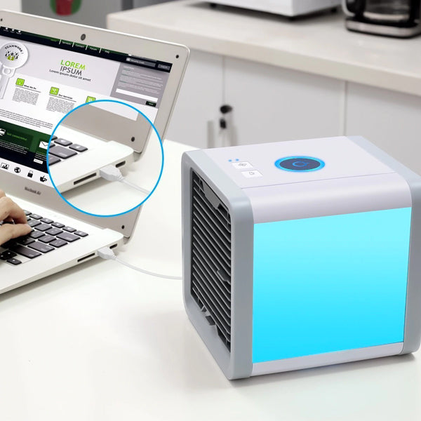 "Climatiseur portable 3-en-1 compact, polyvalent, avec éclairage LED multicolore, idéal pour refroidir et humidifier."