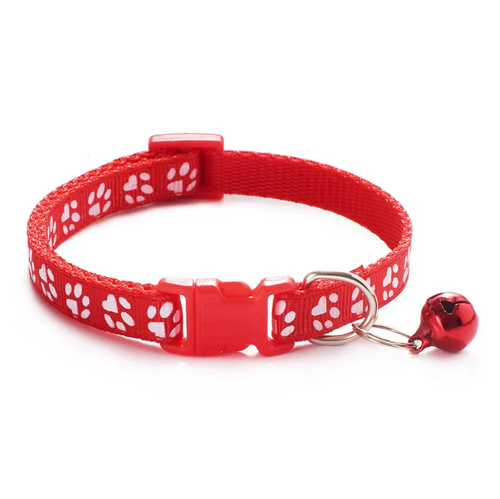 "Collier réglable pour chat avec clochette, motif de patte, boucle sécurisée, couleur vive, pour sécurité et élégance."