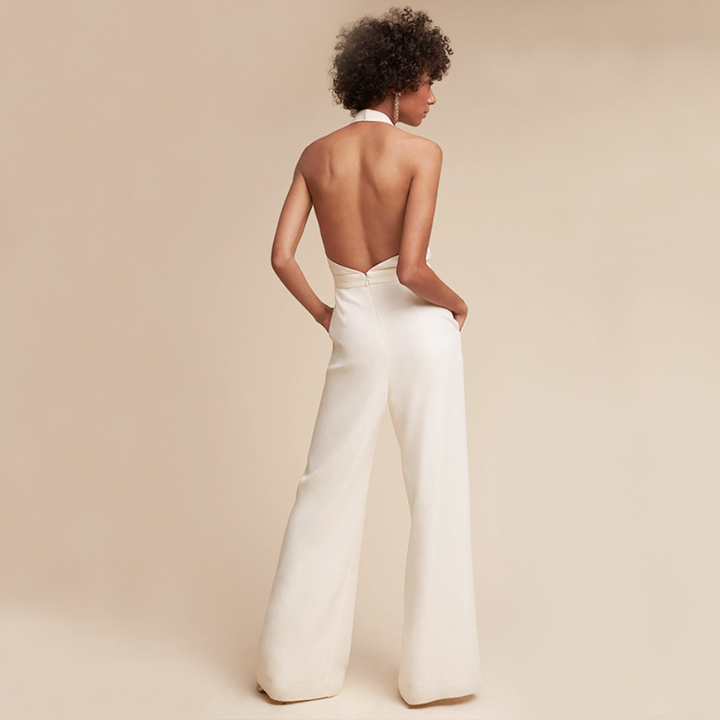"Combinaison longue extensible femme, coupe fluide, jambes larges, tissu doux, élégance et confort moderne"
