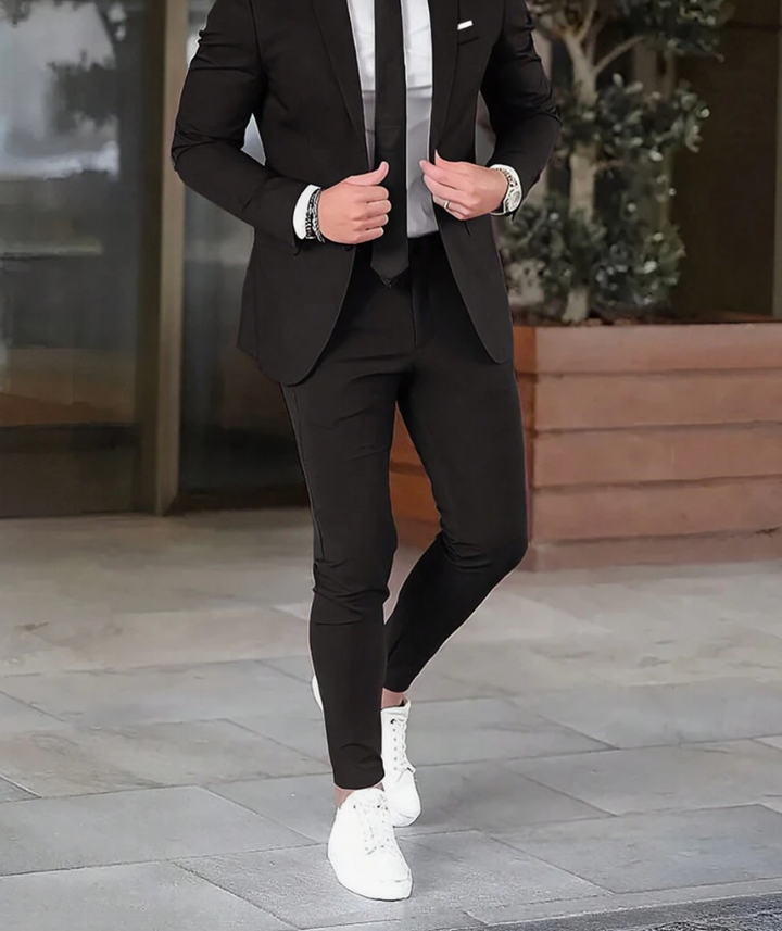 "Costume homme Bastien: veste gris anthracite et pantalon assorti, coupe moderne, pour occasions formelles et décontractées"