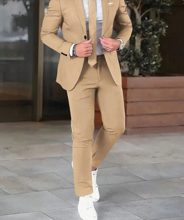 "Costume homme Bastien: veste gris anthracite et pantalon assorti, coupe moderne, pour occasions formelles et décontractées"