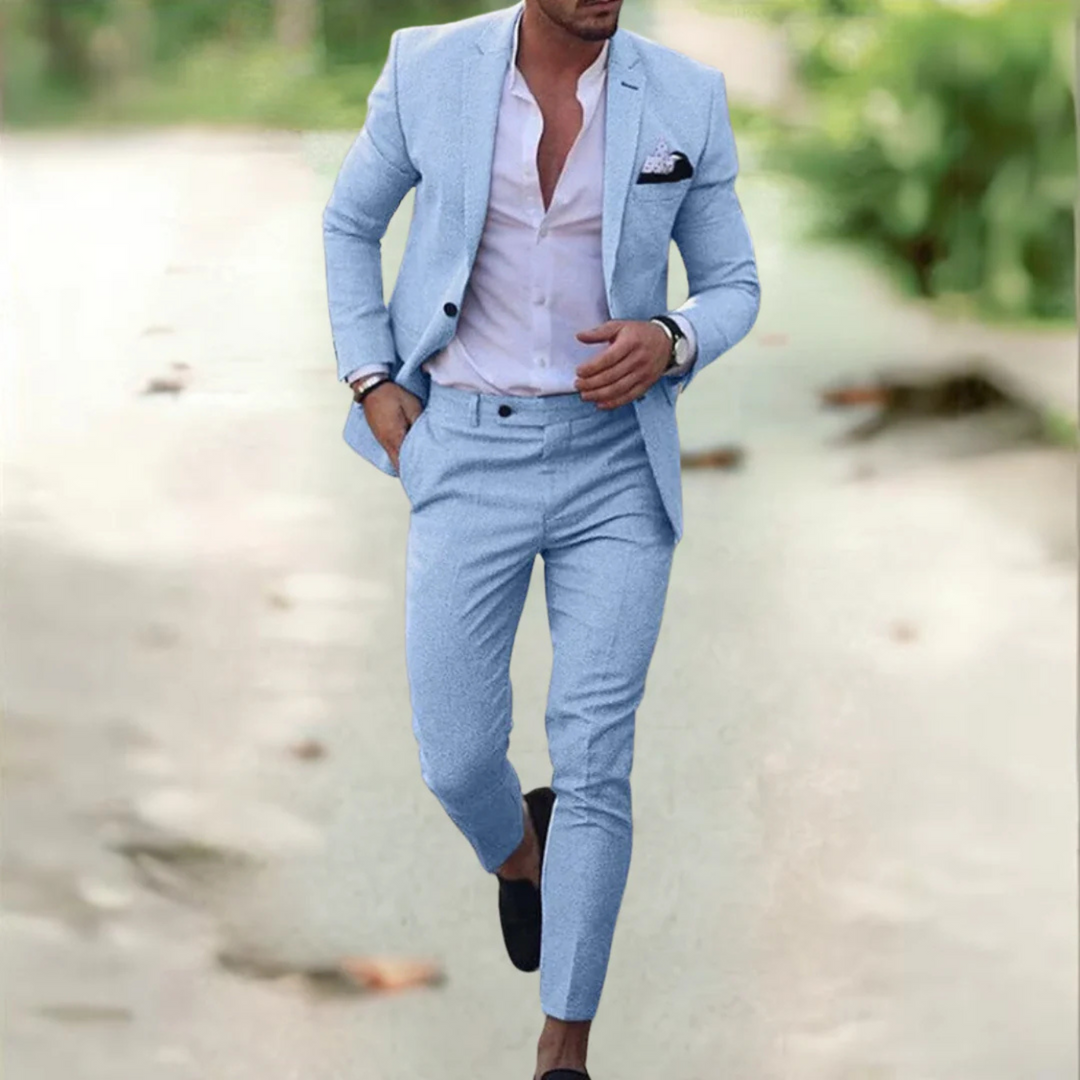 "Costume homme slim élégant, coupe ajustée, tissu léger, fond blanc, idéal pour occasions formelles et professionnelles."