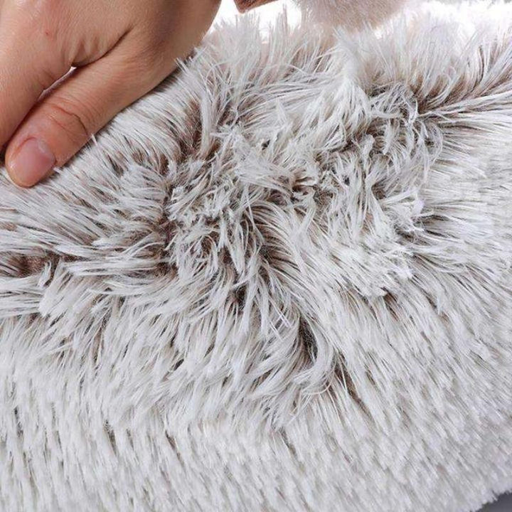 Coussin anti-stress pour chien, couleur abricot, design doux et enveloppant, idéal pour apaiser les chiens anxieux.