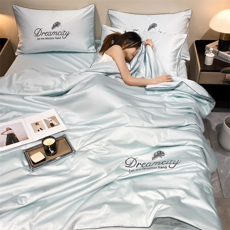 "Couverture rafraîchissante CoolNuit, tissu glacé, aération optimale, parfaite pour nuit chaude, douceur soyeuse"