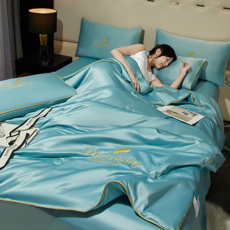 "Couverture rafraîchissante CoolNuit, tissu glacé, aération optimale, parfaite pour nuit chaude, douceur soyeuse"