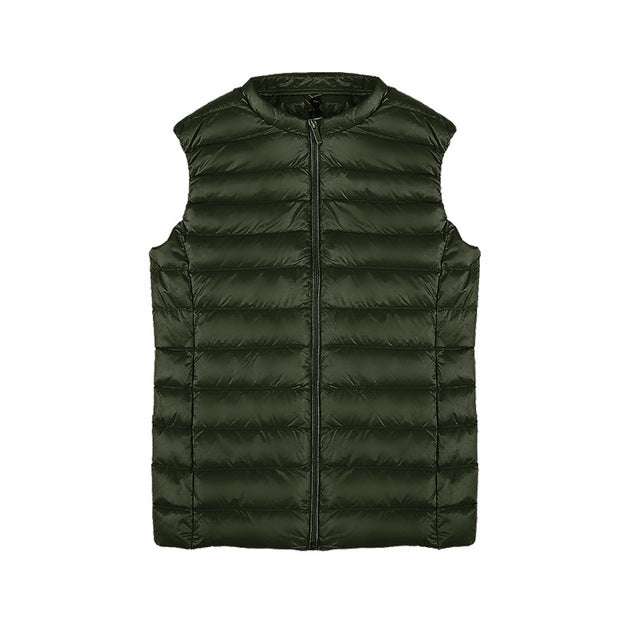 "Doudoune sans manches ultra-légère pour femme, design chic, compacte, avec traitement déperlant, idéale par tous les temps."