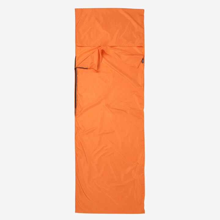 "Drap de sac de couchage léger et respirant pour bivouac, idéal pour aventures en plein air et trekking, structure douce."