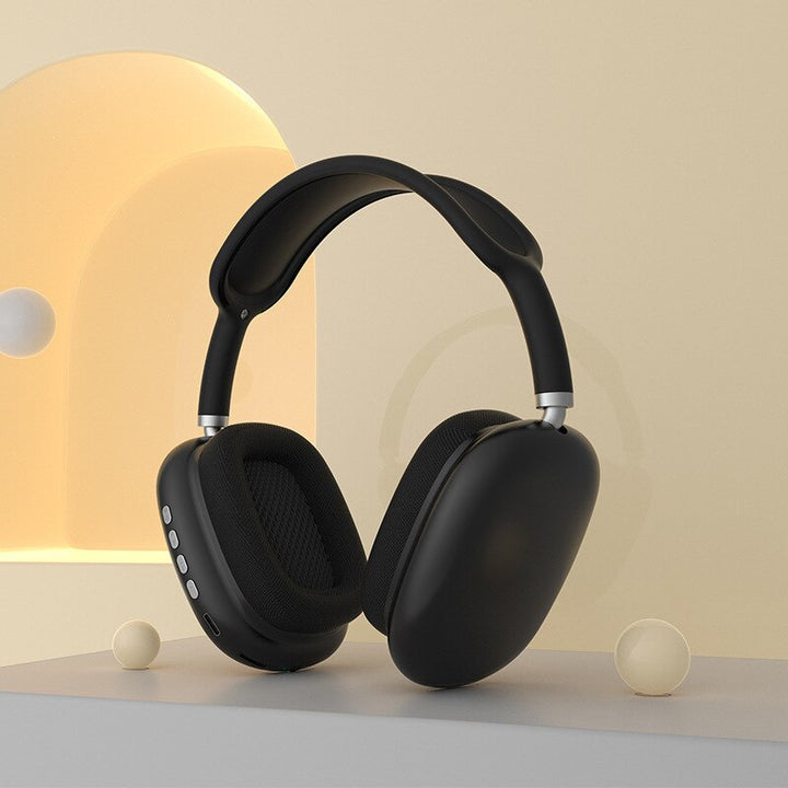 "Écouteurs sans fil noirs avec arceau ajustable, design ergonomique et technologie Bluetooth pour un confort optimal"