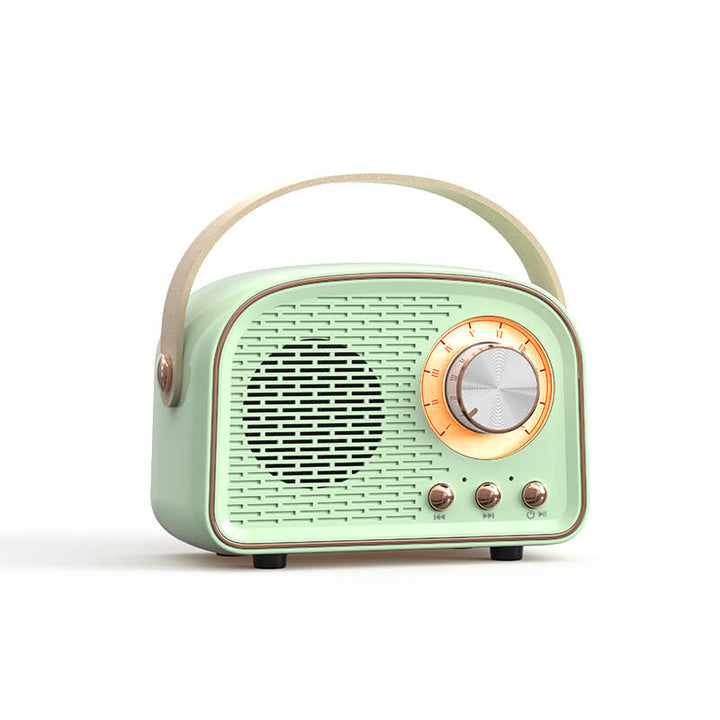 "Enceinte Bluetooth vintage au design rétro, radio FM intégrée, compacte, élégante, son clair, options de couleurs variées."