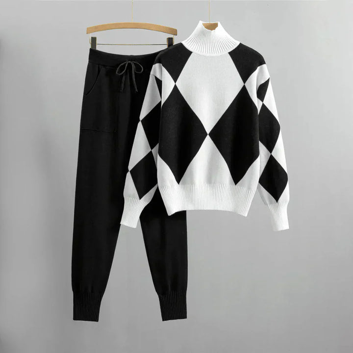 Ensemble deux pièces femme en polyester doux, sweat à manches longues rouge et pantalon taille haute pour confort optimal.