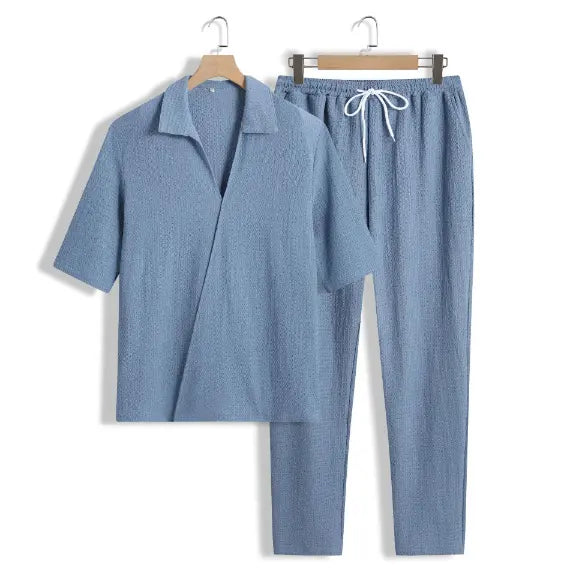 "Ensemble deux pièces homme moderne, style chic décontracté, ton neutre, coupe ample, parfait pour toutes occasions."
