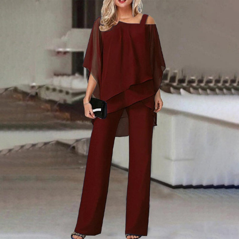 "Ensemble élégant 2 pièces Olivia avec manches batwing, disponible en blanc, bleu, noir, rouge pour occasions spéciales."
