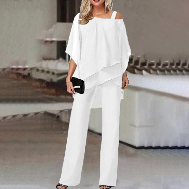 "Ensemble élégant 2 pièces Olivia avec manches batwing, disponible en blanc, bleu, noir, rouge pour occasions spéciales."