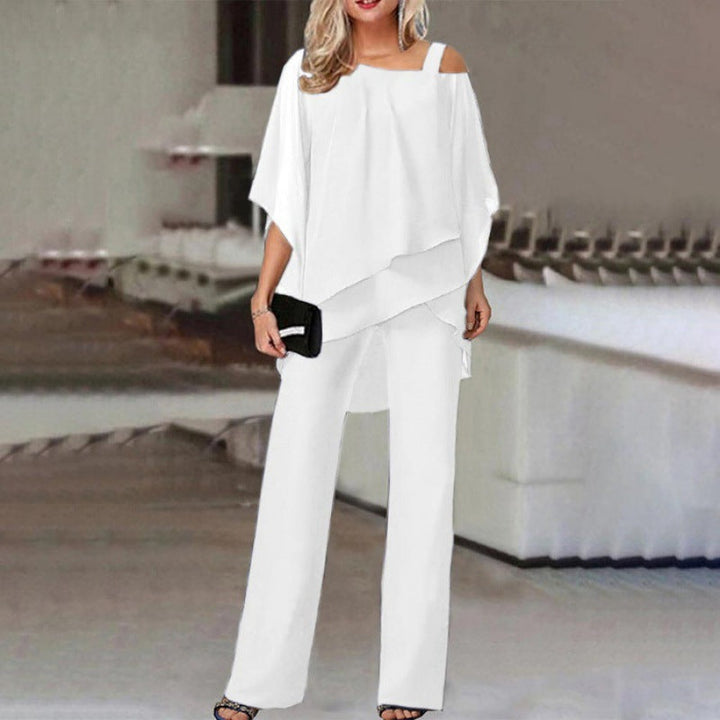 "Ensemble élégant 2 pièces Olivia avec manches batwing, disponible en blanc, bleu, noir, rouge pour occasions spéciales."