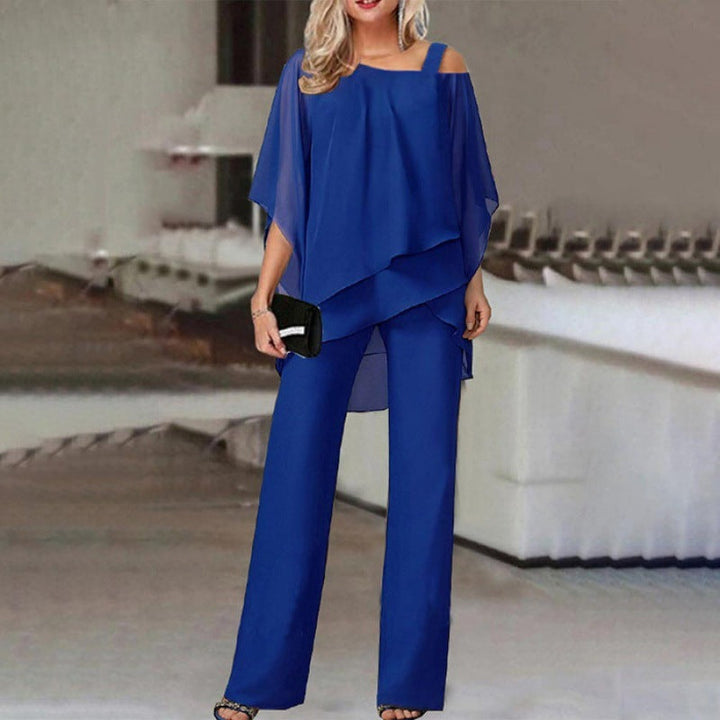 "Ensemble élégant 2 pièces Olivia avec manches batwing, disponible en blanc, bleu, noir, rouge pour occasions spéciales."