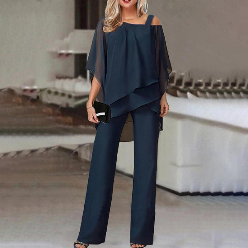 "Ensemble élégant 2 pièces Olivia avec manches batwing, disponible en blanc, bleu, noir, rouge pour occasions spéciales."